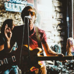 man playing guitar